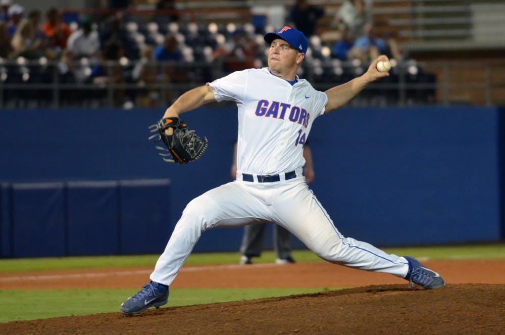 <p>UF's Bobby Poyner throws a slider during Florida's 14-3 win against the South Carolina Gamecocks on April 11, 2015 at McKethan Stadium.</p>