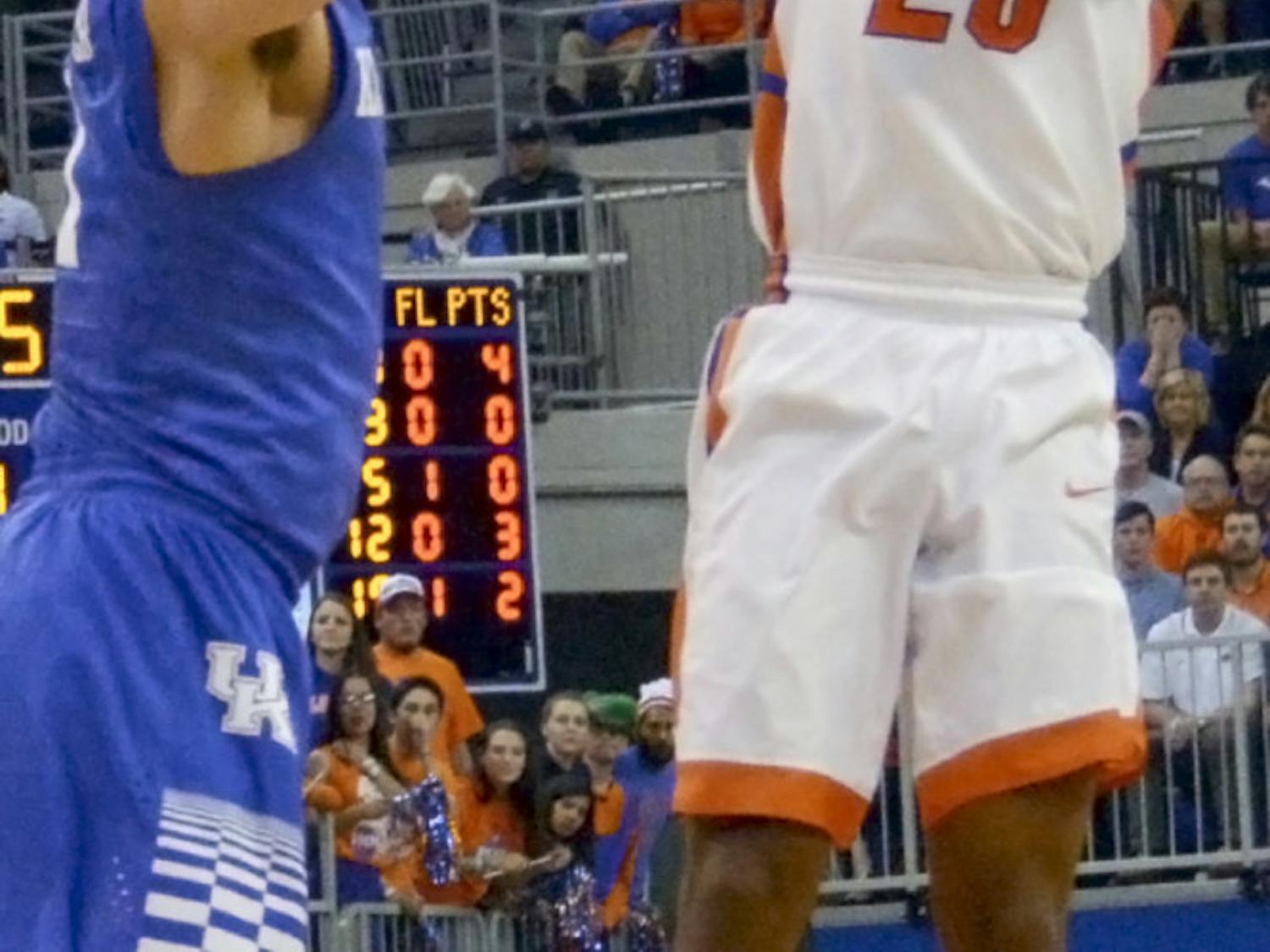 Michael Frazier attempts a three-point shot during Florida's loss to No. 1 Kentucky in the O'Connell Center.