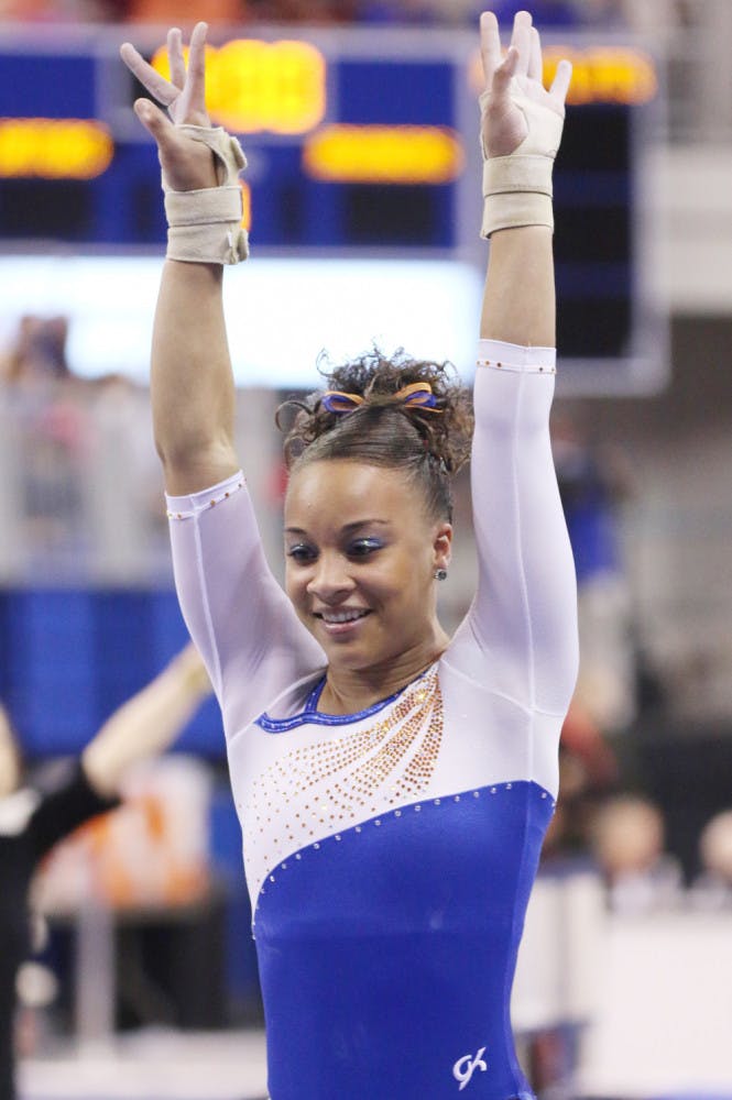 Kytra Hunter performs a vault routine during Florida’s 197.525-196.025 win against Arkansas on Feb. 14 in the O’Connell Center.