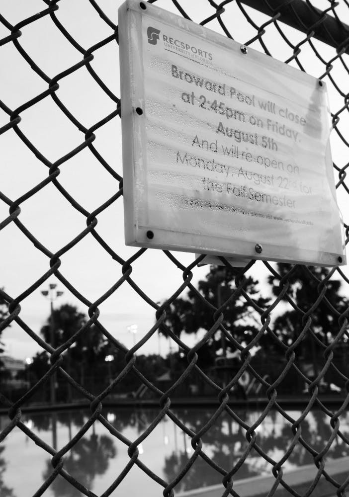A sign outside the Broward Pool reads that the pool will reopen
on Monday, Aug. 22, for the fall semester. Architects have created
designs for the remodel of the Broward-area pool, which include
improvements such as a lazy river.