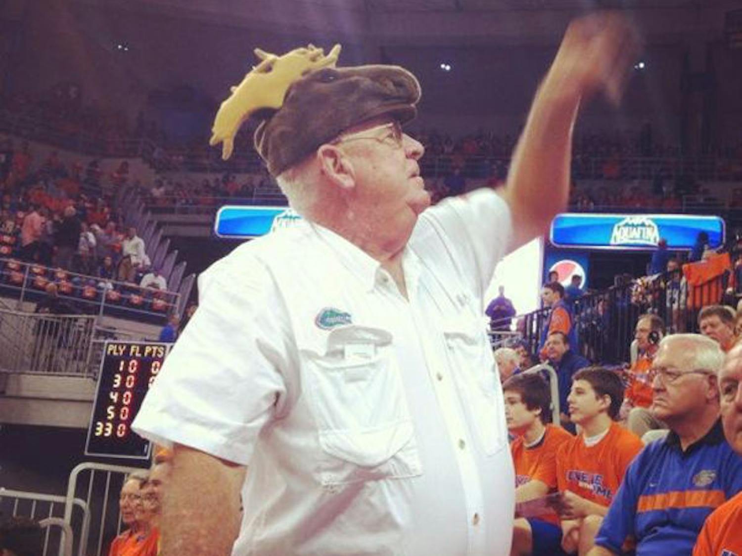 Ron Davis has been attending Florida basketball games since his days as a student in the early 1960s. In 1988, he adopted a routine involving a green Speedo and a moose hat in an attempt to distract opposing free-throw shooters.&nbsp;