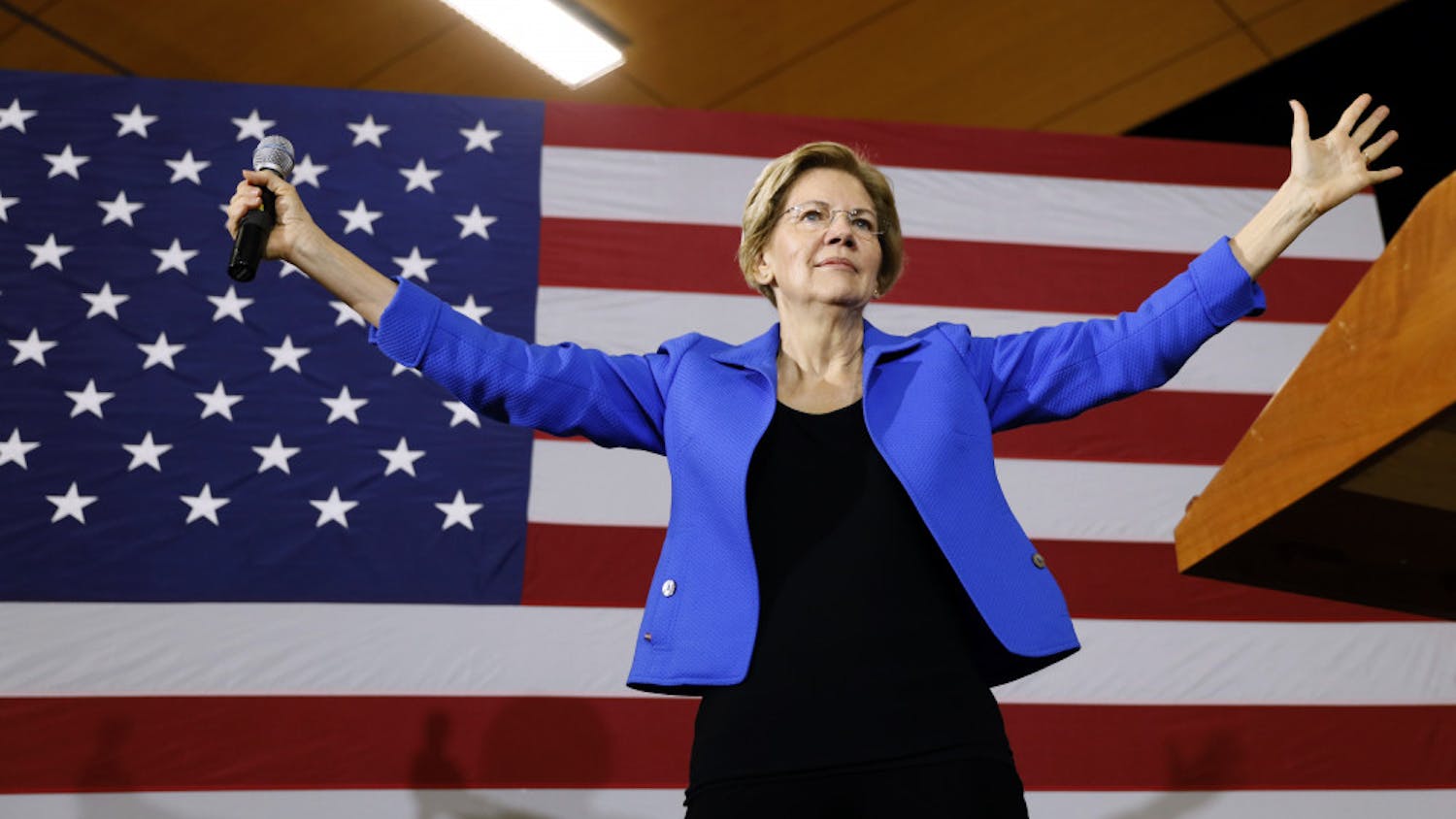FILE - In this Oct. 21, 2019, photo, Democratic presidential candidate Sen. Elizabeth Warren, D-Mass., speaks to students and staff at Roosevelt High School in Des Moines, Iowa. For Warren, it was supposed to be another big idea in a campaign full of them: A promise that everyone could get government-funded health care, following the lead of her friend and fellow White House hopeful Bernie Sanders. (AP Photo/Charlie Neibergall, File)