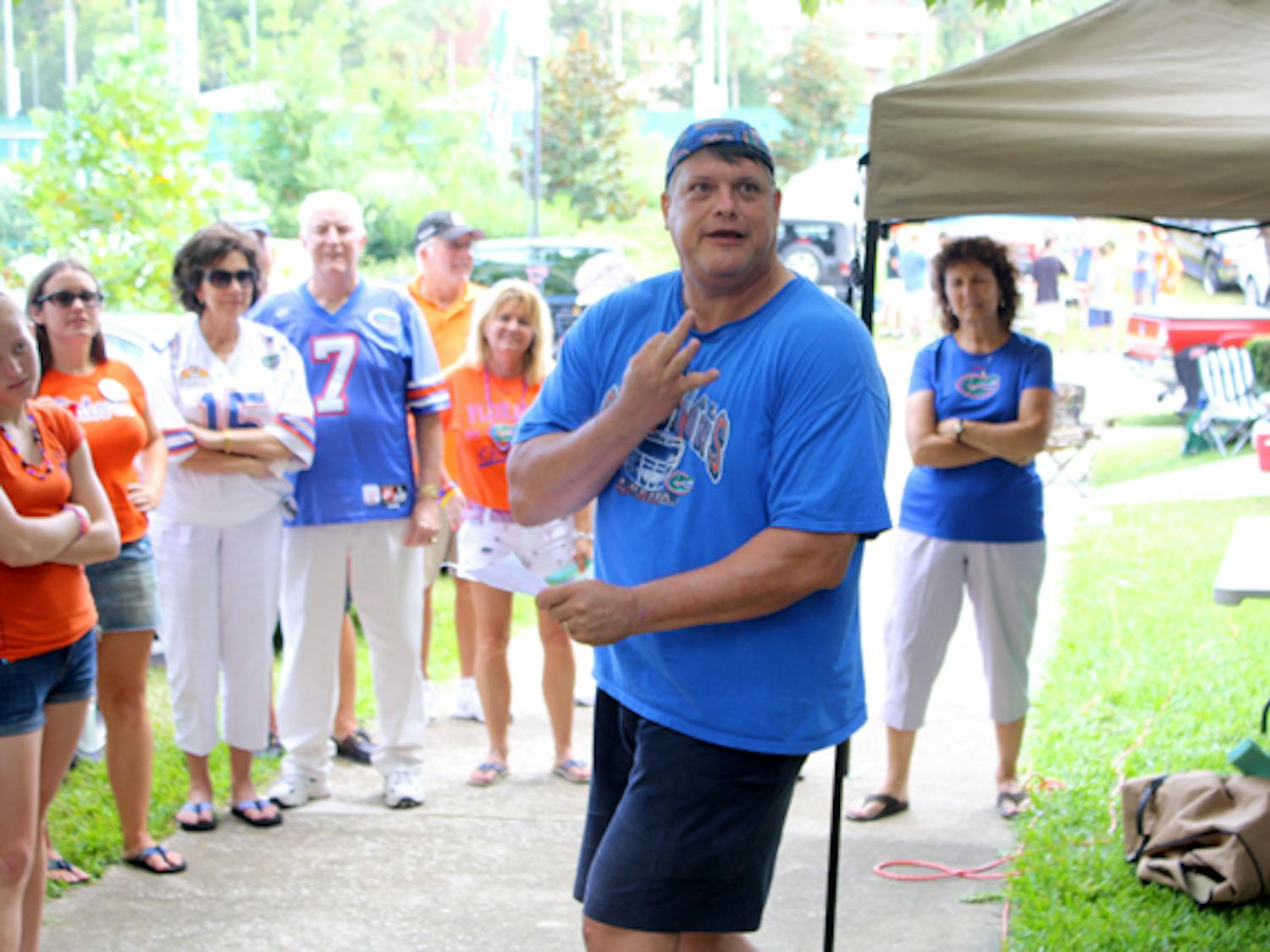 Anthony "Gator Tony" Burke has become a quintessential gameday figure on campus, giving toasts to pump up tailgaters before every home game.