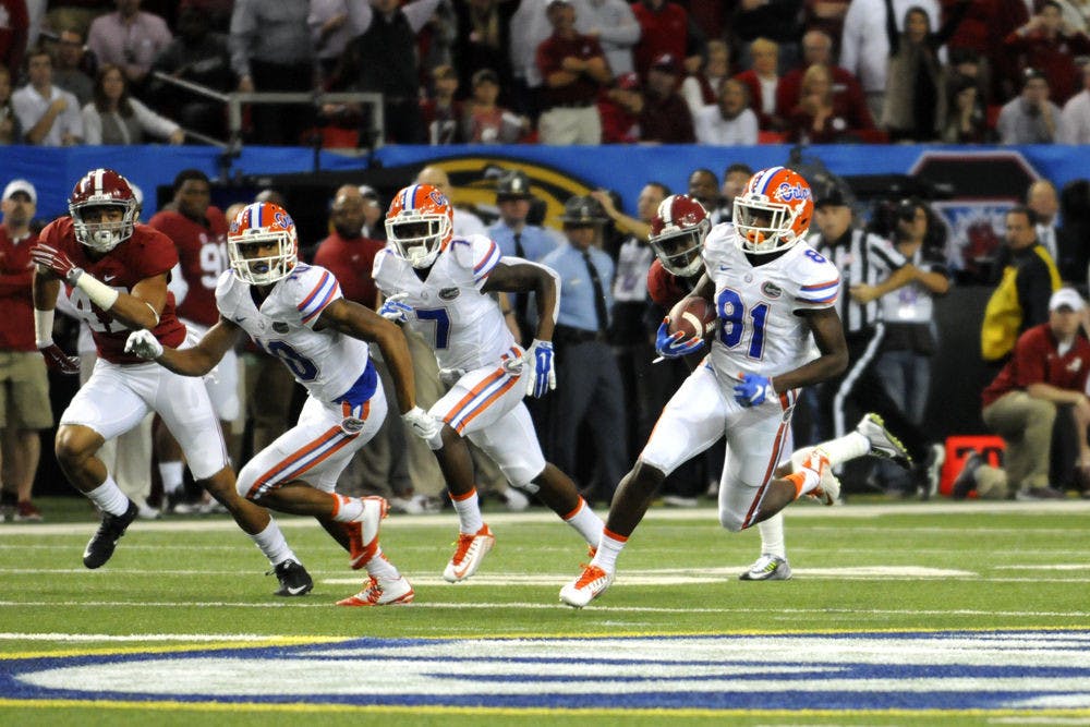 <p>UF's Antonio Callaway (81) returns a punt 85 yards for a touchdown during Florida's 29-15&nbsp;loss to Alabama&nbsp;in the Southeastern Conference Championship Game on Dec. 5, 2015, in the Georgia Dome in Atlanta.</p>