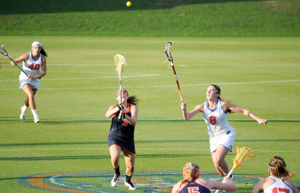 <p>Shannon Gilroy fights for a draw control during Florida's 14-13 overtime loss to Syracuse on Tuesday at Donald R. Dizney Stadium.</p>