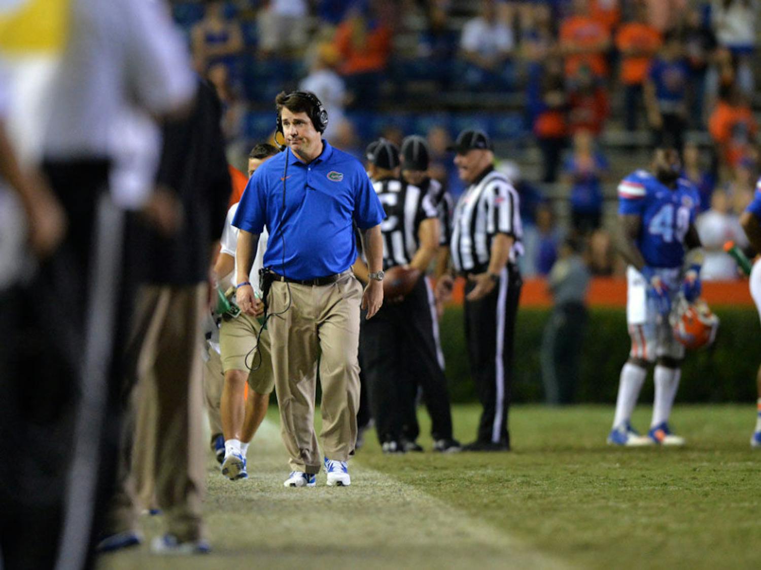 Florida head coach Will Muschamp walks down the sideline during Florida's 42-13 loss to Missouri on Saturday at Ben Hill Griffin Stadium.