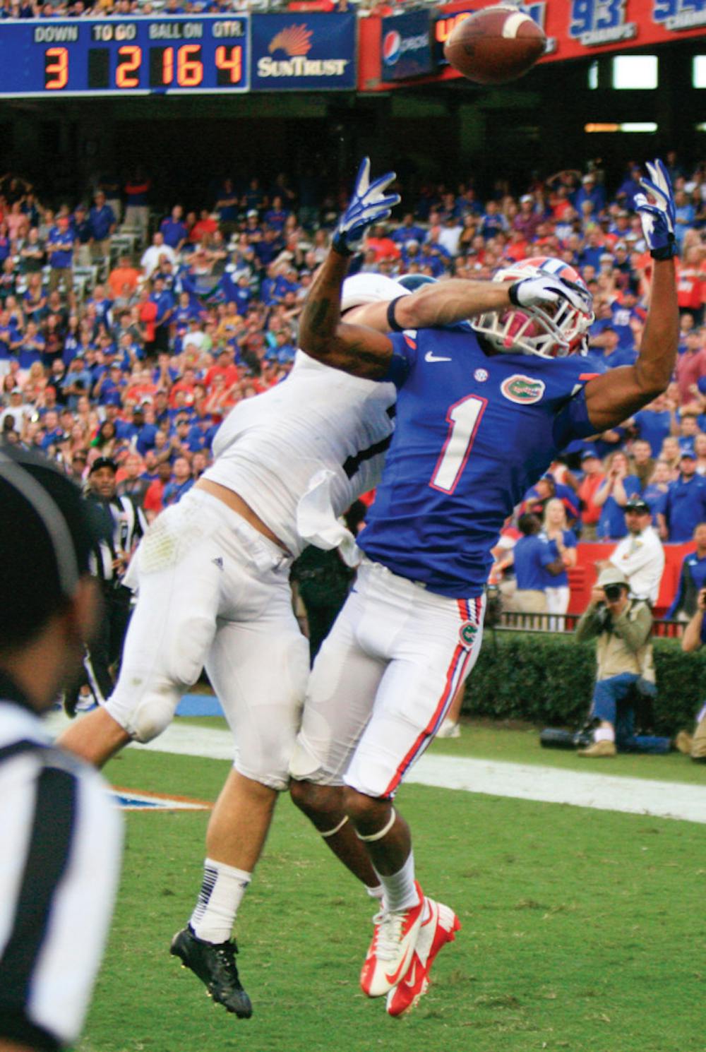 <p>Quinton Dunbar attempts to catch a pass in the end zone during the fourth quarter of Florida’s 26-20 loss to Georgia Southern on Nov. 23, 2013, in Ben Hill Griffin Stadium. </p>