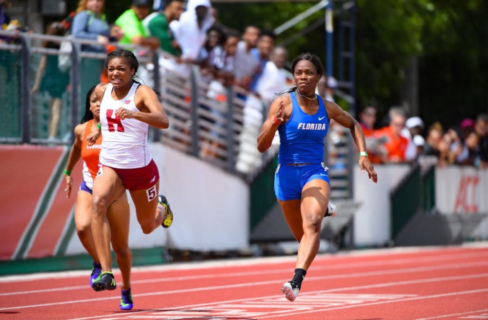 <p>Shayla Sanders runs the 100-meter dash at the Hurricane College Invitational on March 25, 2017.</p>