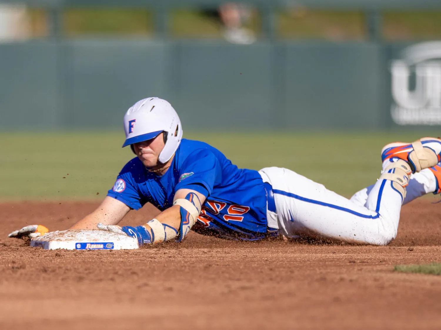 Florida infielder Ethan Surowiec (10) slides to second base during an NCAA college baseball game against Auburn at Condron Family Ballpark in Gainesville, Fla., Friday, April 17, 2026.