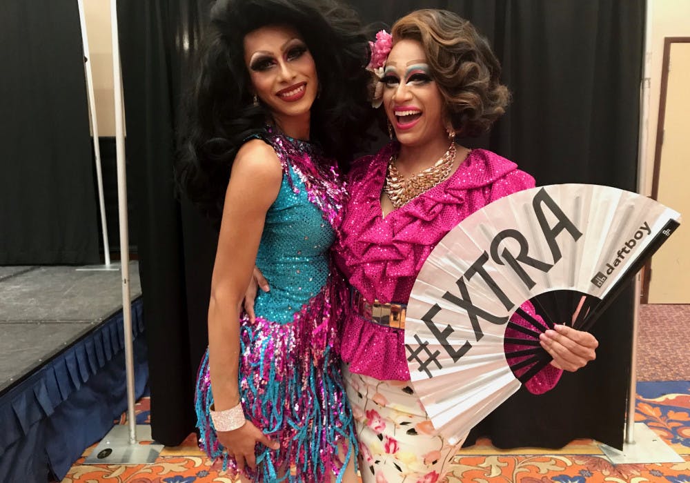 <p><span id="docs-internal-guid-29176e35-844a-f43f-a826-b65070dc4494"><span>Deafies in Drag stars Casa Vina (left) and Selena Minogue (right) pose with their fan.</span></span></p>