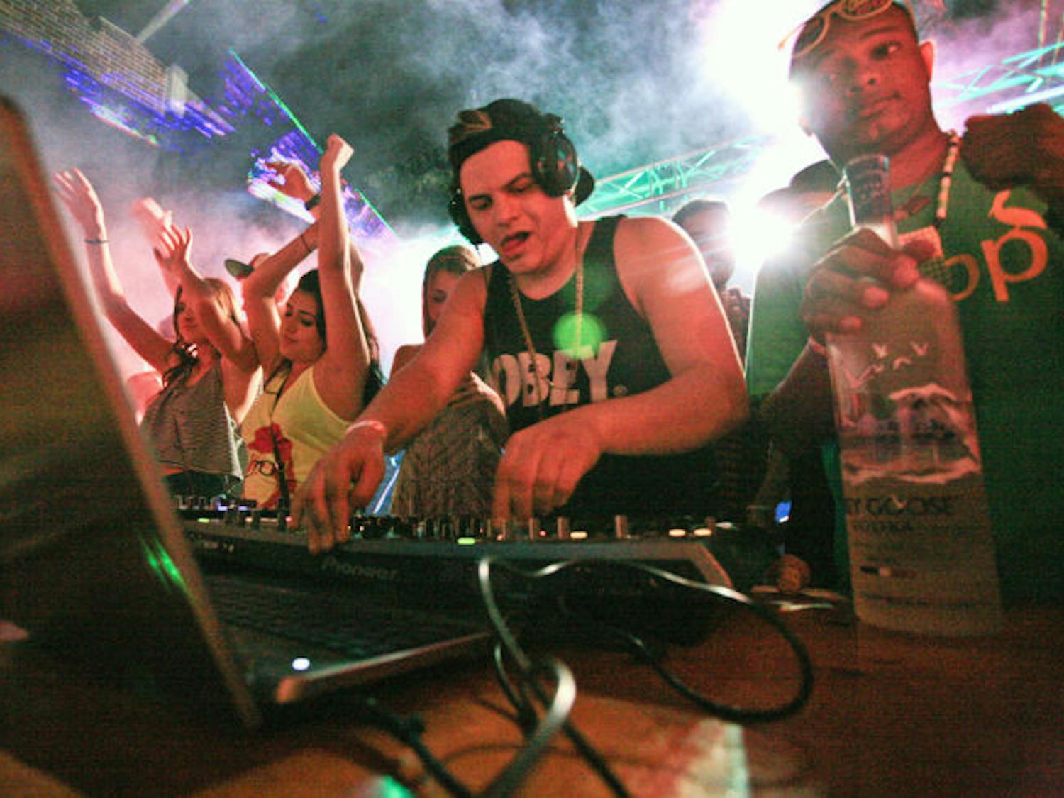 David Joseph Lopez Jr., 21, known as Luminox, performs at Sigma Alpha Epsilon on Saturday night. Lopez was taken to Shands at UF after he was too intoxicated to finish his set.