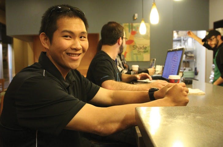 UF criminology junior Nikolas Wong, 21, sits in Starbucks on 3443 SW Archer Road, where he wrote some of his book containing 10 short satire stories. “The Coffee House” can be purchased on Amazon.com for $10. A portion of the profits from the book will be donated to the American Cancer Society.