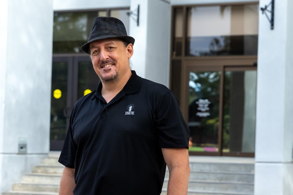 <p>Newly elected Gainesville City Commissioner James Ingle stands in front of City Hall on Thursday, Oct. 24, 2024.</p>