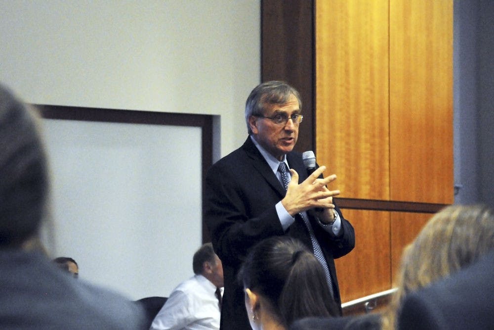 <p>UF president Kent Fuchs explains the premise of his goal-setting committee to a room of about 100 UF students at the start of the student town hall meeting on July 7 at the Levin College of Law. The 17-person committee released its draft goals on Thursday, which will remain online for feedback and critique until Aug. 7.</p>