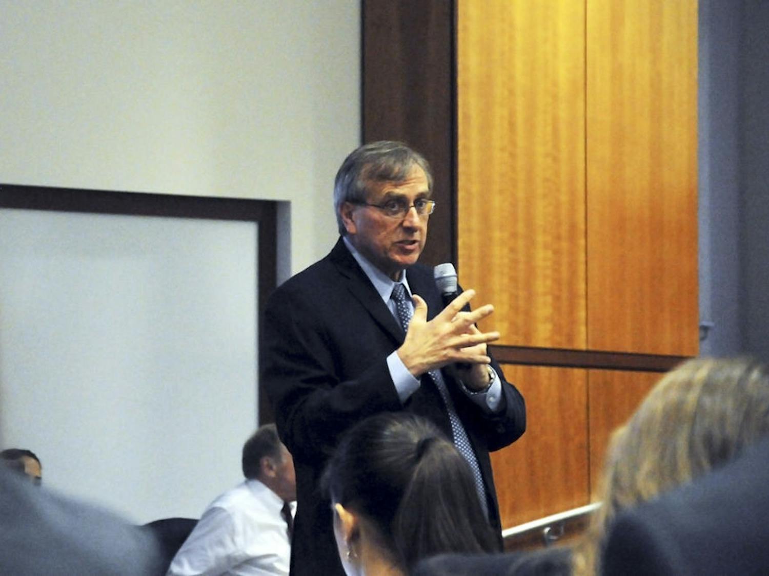 UF president Kent Fuchs explains the premise of his goal-setting committee to a room of about 100 UF students at the start of the student town hall meeting on July 7 at the Levin College of Law. The 17-person committee released its draft goals on Thursday, which will remain online for feedback and critique until Aug. 7.
