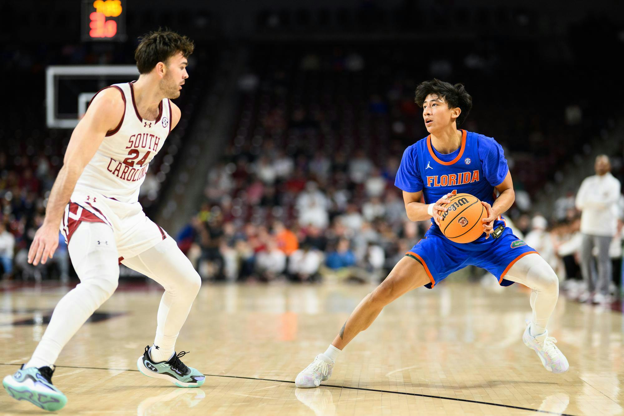 Florida guard Xaivian Lee (1) pulls back for a three during the second half of an NCAA college basketball game against South Carolina, Wednesday, Jan. 28, 2026, in Columbia, S.C.