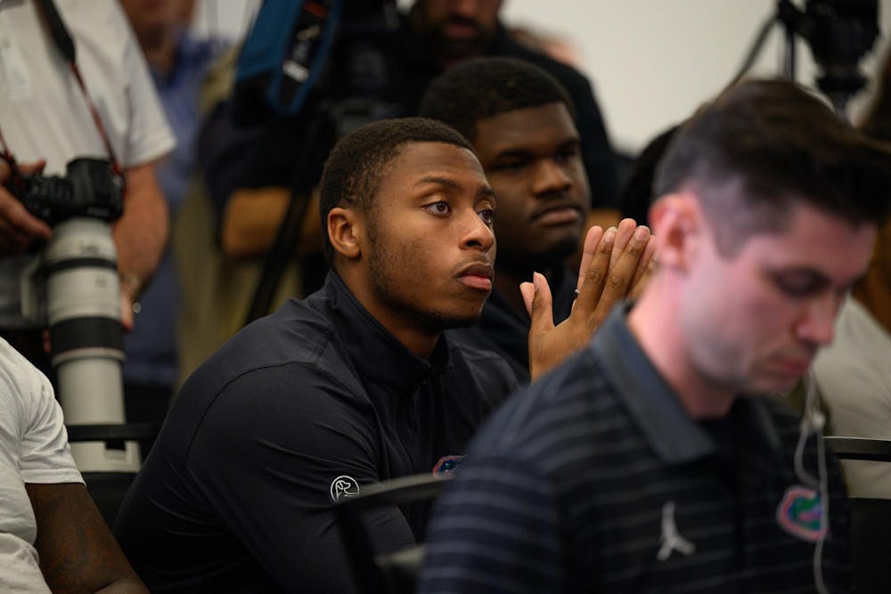 Florida quarterback DJ Lagway watches Scott Stricklin speak at Jon Sumrall’s introductory press conference at Heavener Football Training Center in Gainesville, Fla., Monday, Dec. 1, 2025.