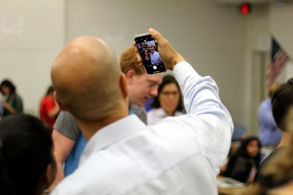 New Jersey Senator Cory Booker and Senator Bill Nelson meet with UF College Democrats at Weil Hall on Friday afternoon. Senator Booker took selfies and posted an Instagram story of the meeting with students yelling “Go Gators.”