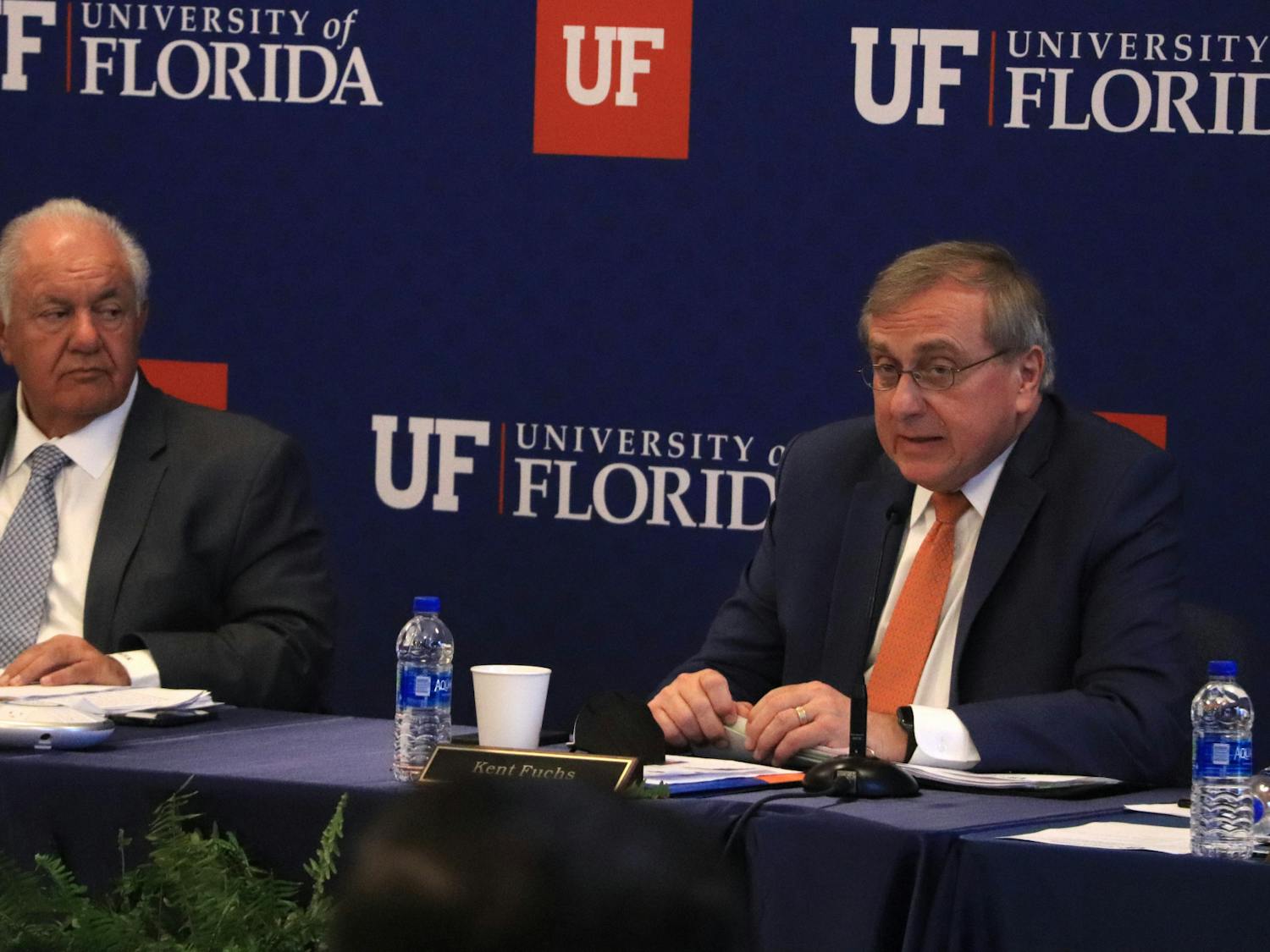 UF President Kent Fuchs and Board of Trustees Chair Mori Hosseini are seen during the meeting at Emerson Alumni Hall on Friday, Dec. 3, 2021.