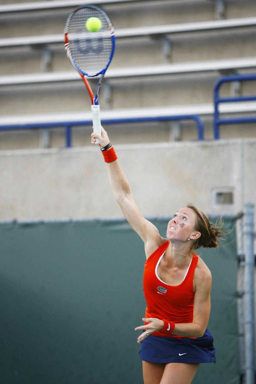 <p>Senior Lauren Embree hits a ball in Linder Stadium. Embree won her singles match against Alabama in straight sets on Friday.</p>