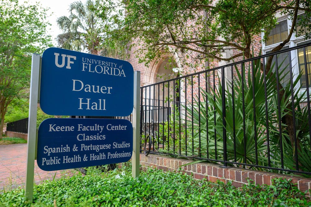 A sign for the Spanish and Portuguese departments stands outside Dauer Hall on UF's campus, Wednesday, April 8, 2026.