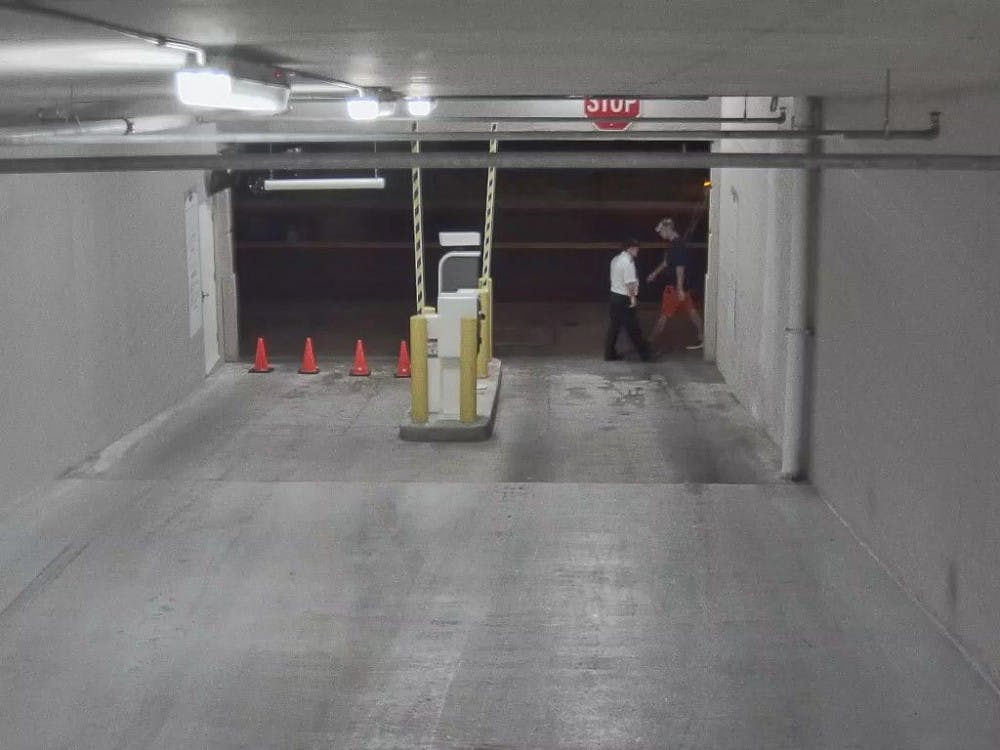 The subject is walking right to left in the frame in the Gator colors in a photo released by Gainesville Police.