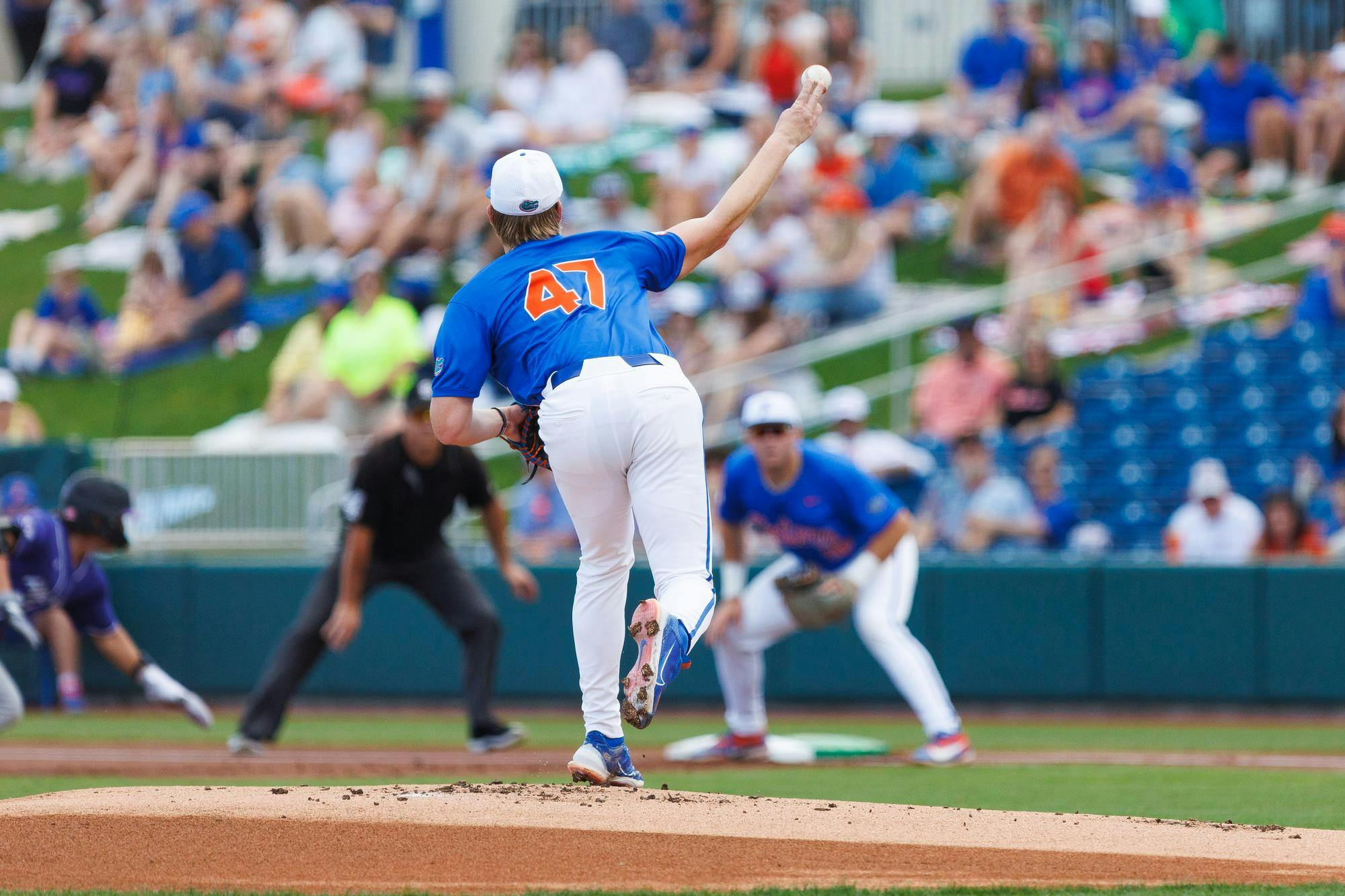 Florida Gators right handed pitcher Aidan King tries to pick off a runner during an NCAA Baseball game against High Point, Saturday, March 7, 2026, in Gainesville, Fla.