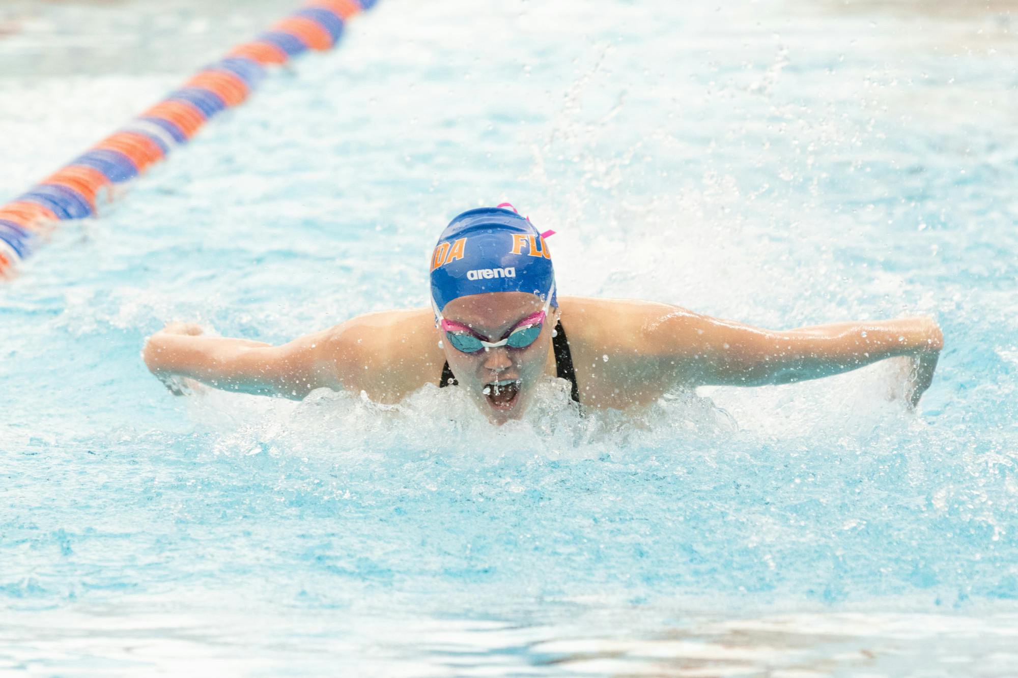 Freshman Catie Choate competes in the women’s 100-yard butterfly at the Florida Invitational on Friday, February 2, 2024.