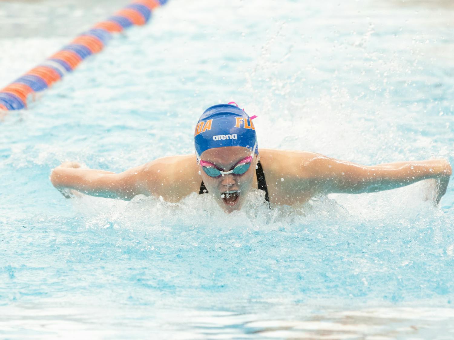 Freshman Catie Choate competes in the women’s 100-yard butterfly at the Florida Invitational on Friday, February 2, 2024.