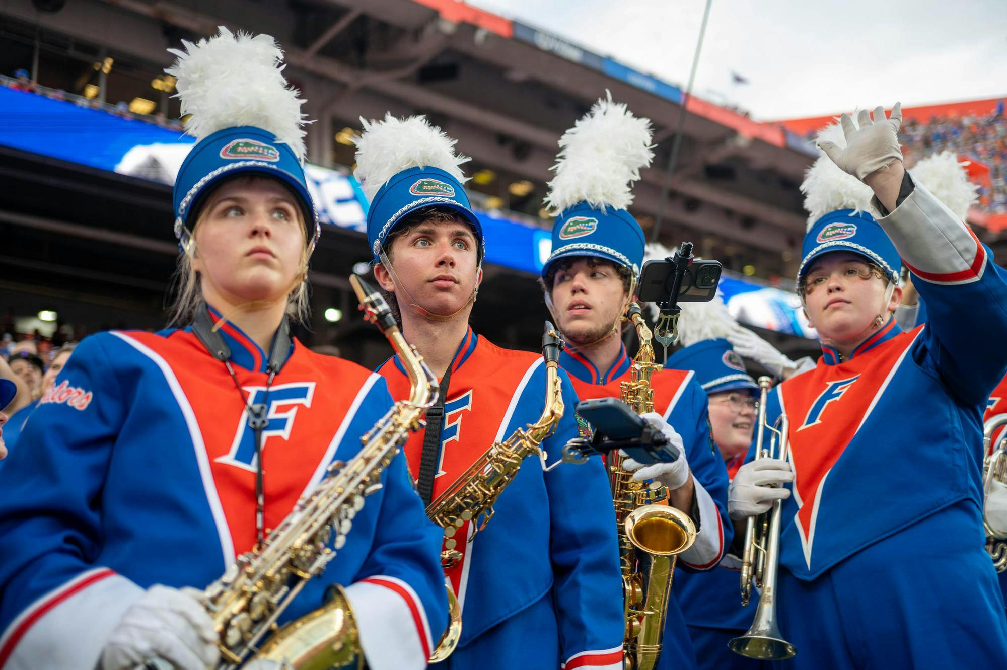 Members of the Florida band wait to walk out onto the field for the halftime show during the first half of an NCAA college football game against Campbell, Saturday, Sept. 12, 2026, in Gainesville, Fla.