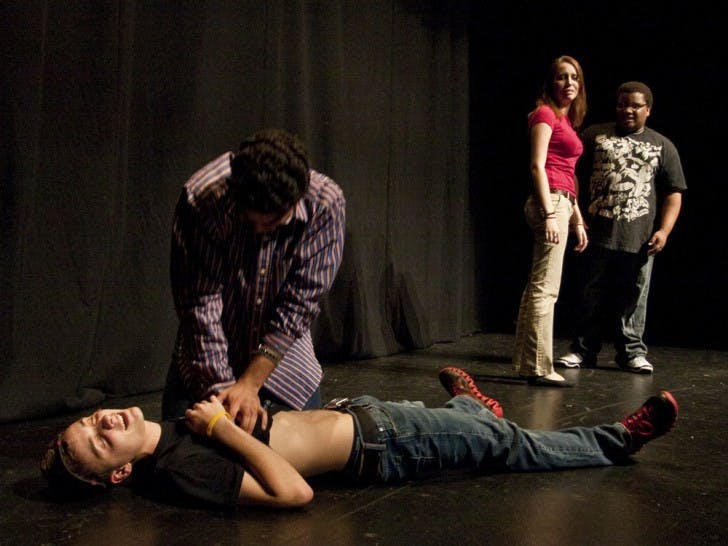 Local comedy troupe the Delta Group performs at the Gainesville Improv Festival on Thursday night.