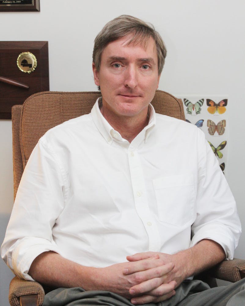 County Commissioner Mike Byerly sits in his office at an Alachua County Commission meeting Tuesday. Byerly is a 12-year commission incumbent.