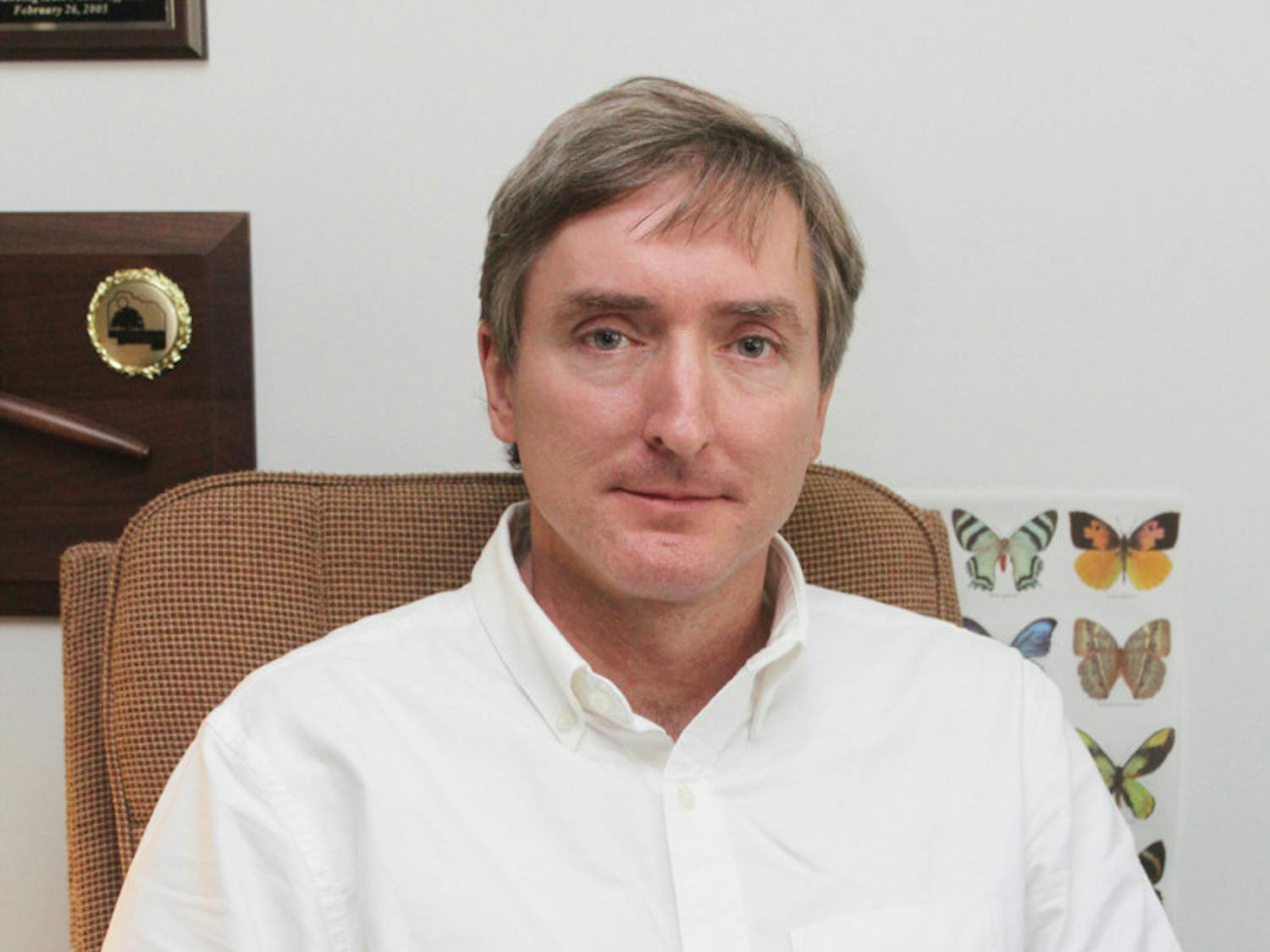 County Commissioner Mike Byerly sits in his office at an Alachua County Commission meeting Tuesday. Byerly is a 12-year commission incumbent.