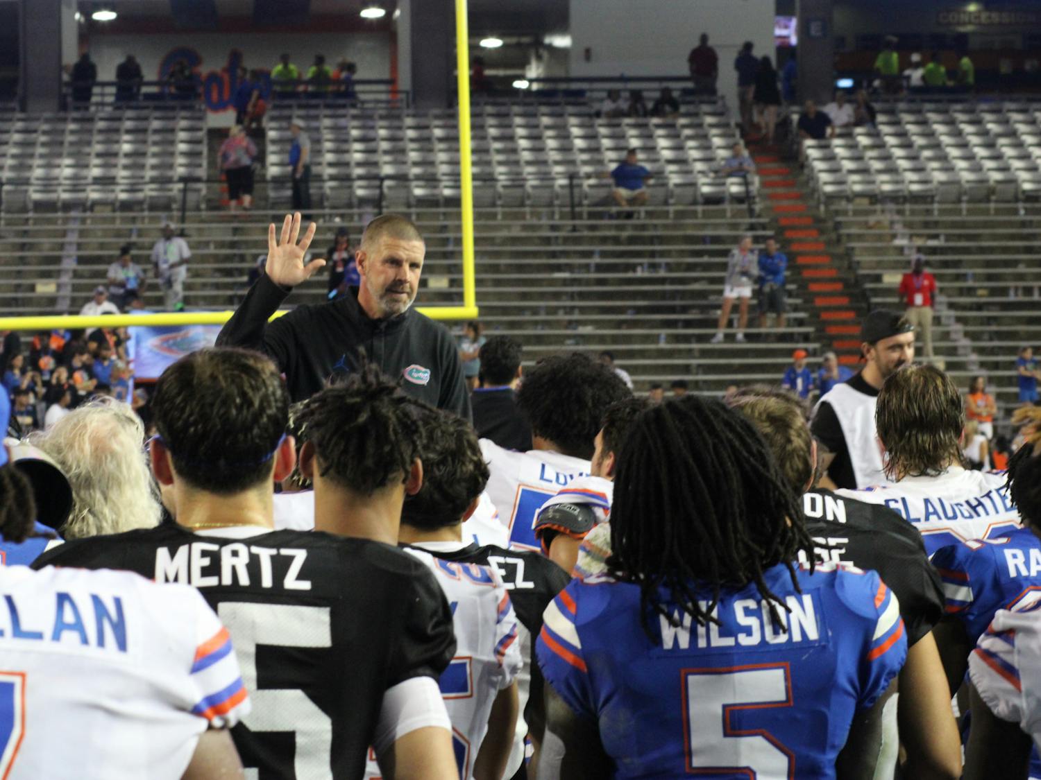 Florida football head coach Billy Napier talks to the Gators following UF's Orange and Blue Game Thursday, April 13, 2023.