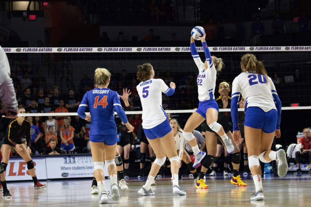 Middle blocker Rachael Kramer (5) managed 11 kills in Florida’s win over in-state rival FSU. 