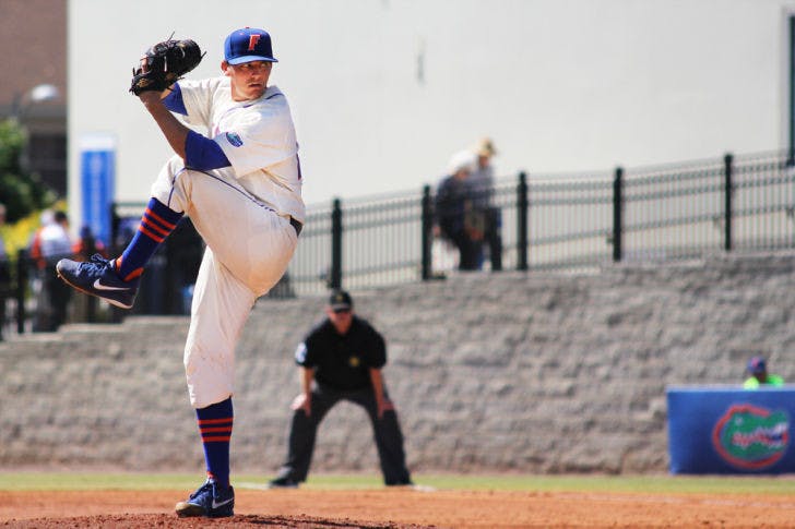 Junior Jonathon Crawford pitches during Florida’s 11-5 loss to Kentucky on March 16 at McKethan Stadium. Crawford&nbsp;allowed just one run in 6.2 innings Thursday against the Bulldogs.