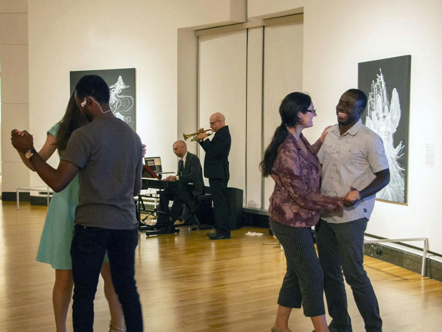 Attendees of the Harn pARTy dance to a live band during the event. The Harn pARTy occurs once during the fall, spring and summer. 