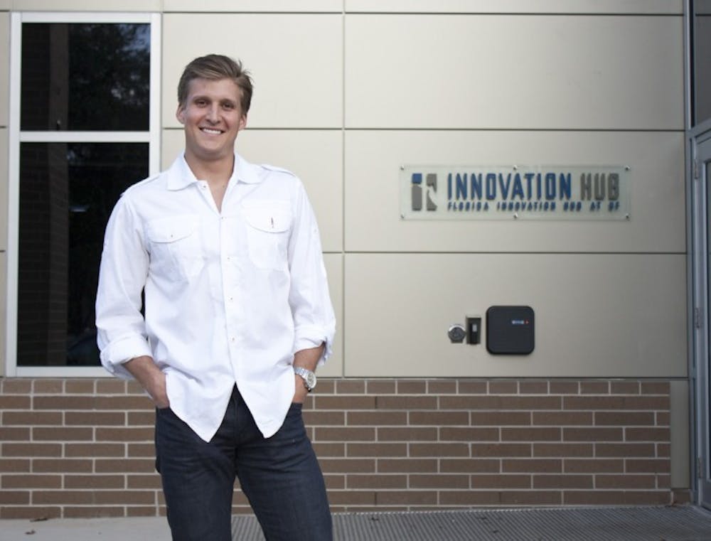 <p>Jordan Johnson poses for a picture Friday evening at the Innovation Hub in downtown Gainesville.&nbsp;</p>