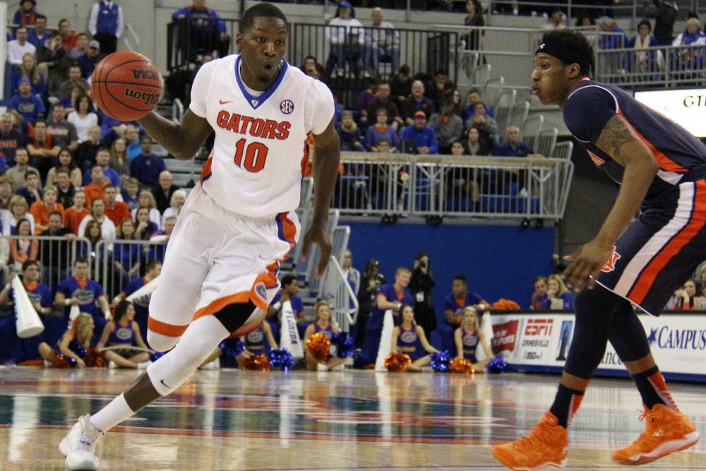 <p>UF’s Dorian Finney-Smith drives into the paint during Florida’s 95-63 win against Auburn on Jan. 23, 2016, in the O’Connell Center.</p>