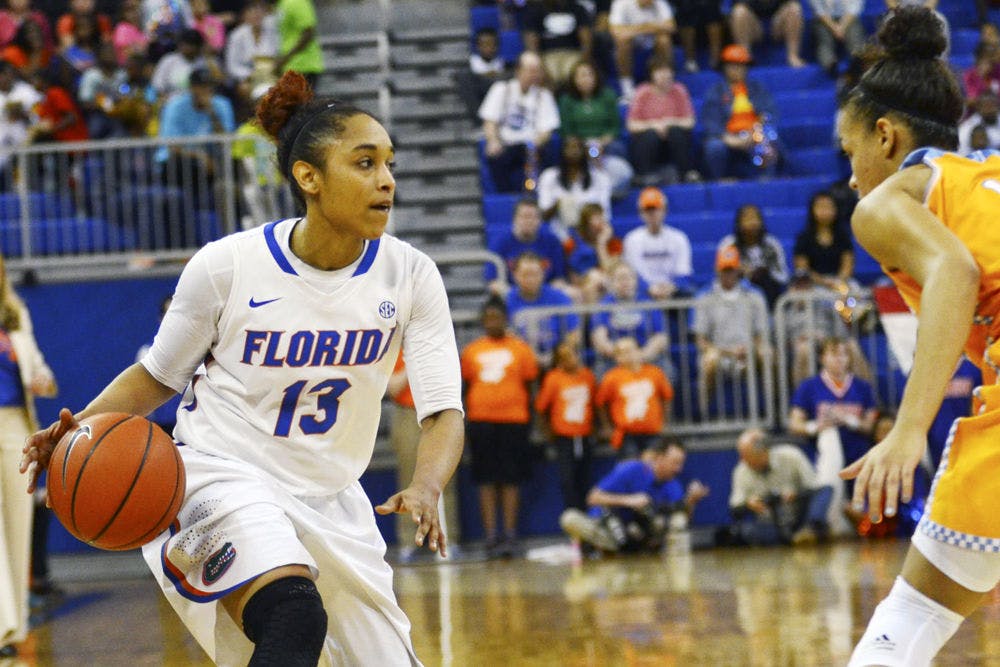 <p>Cassie Peoples drives down the court during Florida's 64-56 loss to No. 6 Tennessee on Feb. 8, 2015 in the O'Connell Center.</p>