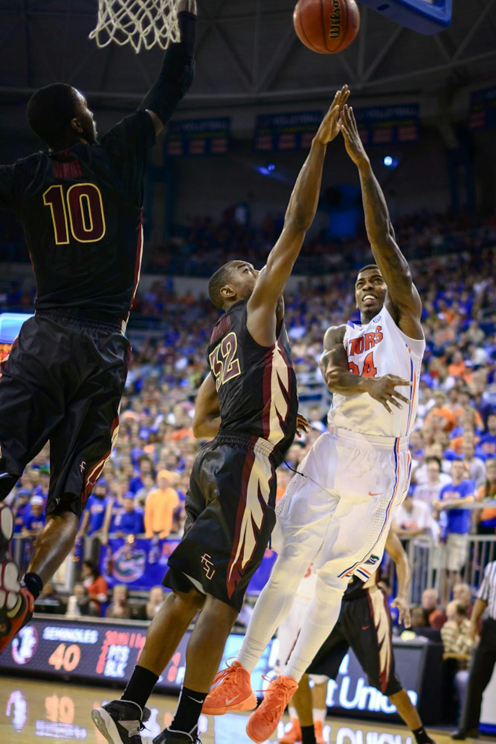 <p>Senior forward Casey Prather attempts a layup during No. 15 Florida's 67-66 win against Florida State on Friday night in the O'Connell Center.</p>