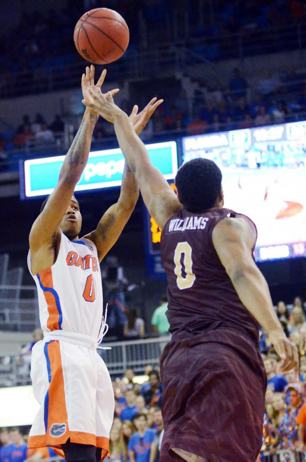 <p>Kasey Hill attempts a jump shot during Florida's overtime win against Louisiana-Monroe. Hill scored a career-high 20 points in UF's 75-64 loss to UNC in the Battle 4 Atlantis tournament on Friday on Paradise Island, Bahamas.</p>