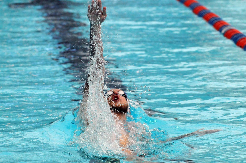 Corey Main races in the 200 meter backstroke during Florida’s meet against Auburn on Jan. 23, 2016, in the O’Connell Center.