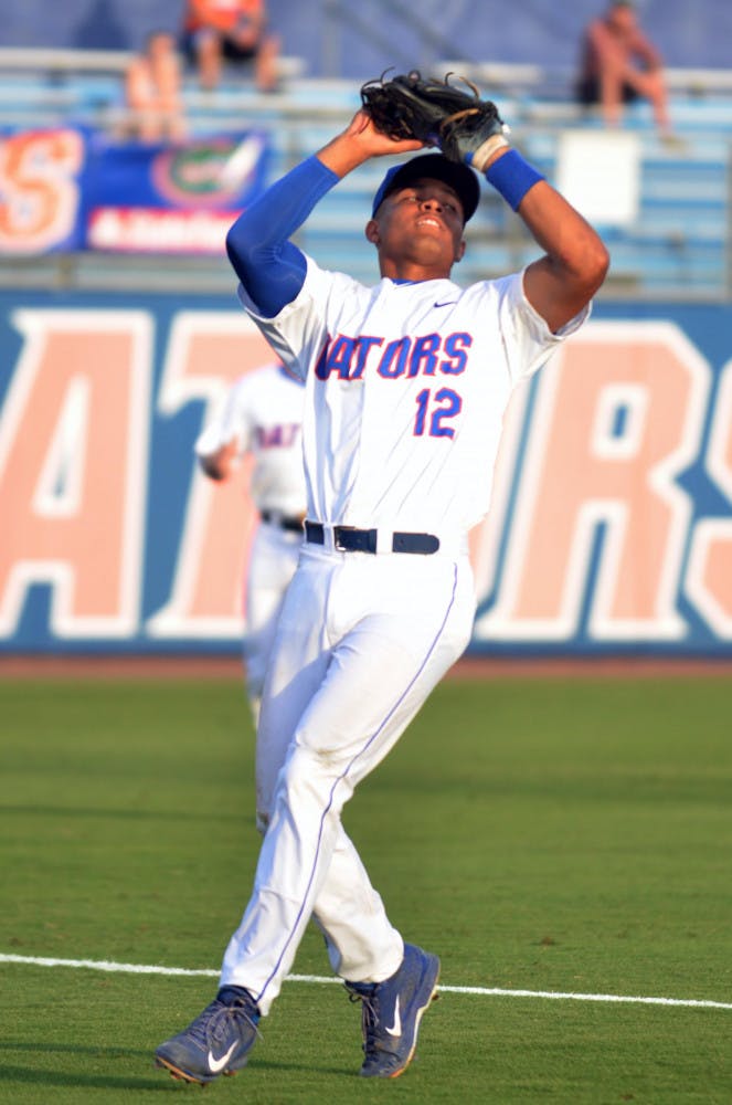 UF shortstop Richie Martin catches a ball for a flyout during Florida's 14-3 win against the South Carolina Gamecocks on April 11, 2015 at McKethan Stadium.