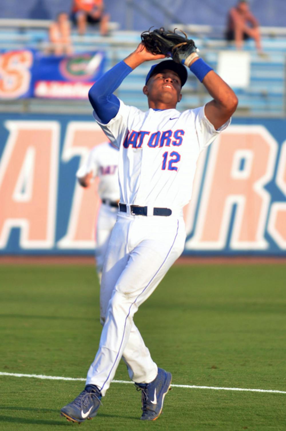 <p>UF shortstop Richie Martin catches a ball for a flyout during Florida's 14-3 win against the South Carolina Gamecocks on April 11, 2015 at McKethan Stadium.</p>