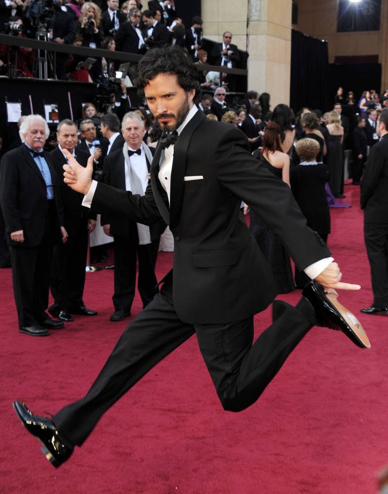 “Conchord” Bret McKenzie arrives at the Oscars ready to have some fun and take home an award.