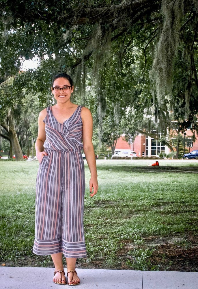 Mallory Laferrier, 25, sporting a striped pastel jumpsuit. This breathable one-piece checks two trend boxes. She found this perfect summer piece at Target.