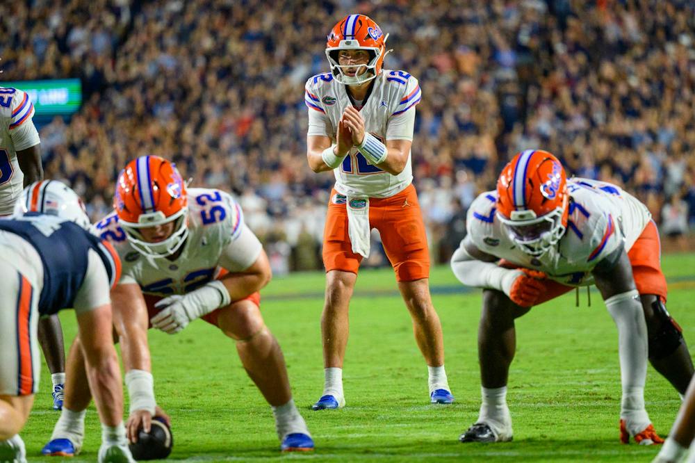 Florida quarterback Aaron Philo (12) snaps during the first half of an NCAA college football game against Auburn, Saturday, Sept. 19, 2026, in Auburn, Ala.