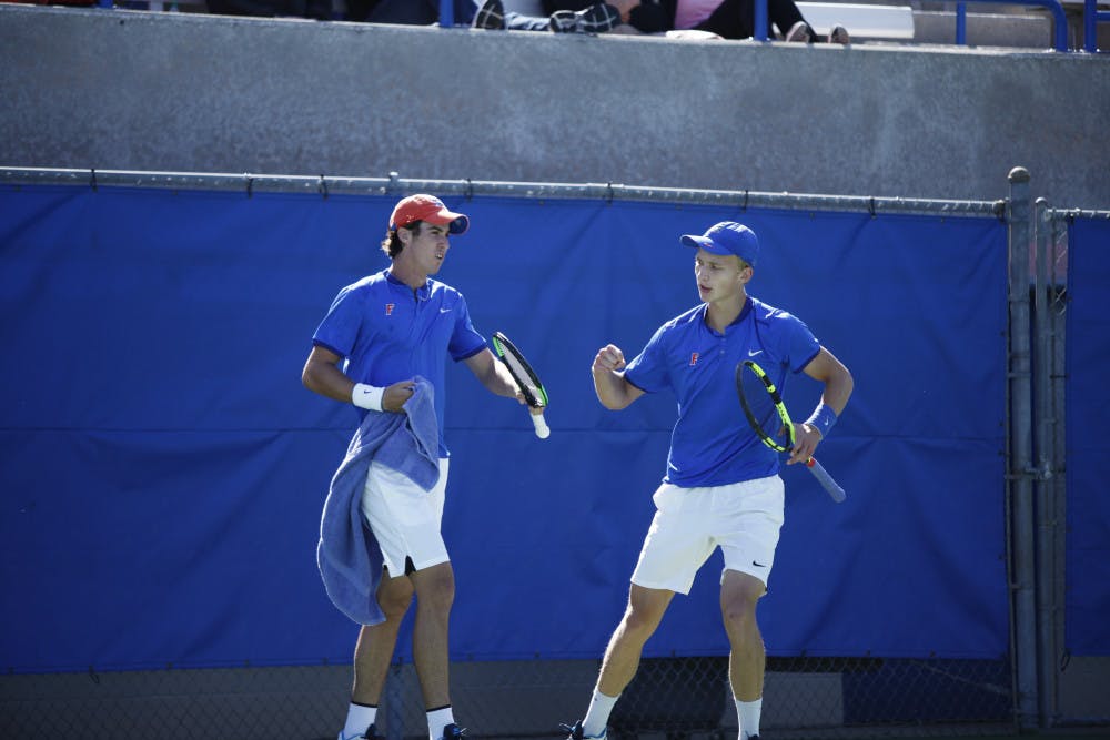 <p>Junior Alfredo Perez (left) was the lone Gator to win his singles match at the NCAA Individual Championships. Sophomore Johannes Ingildsen dropped his match, but will be back in action with Perez in doubles on Thursday. </p>