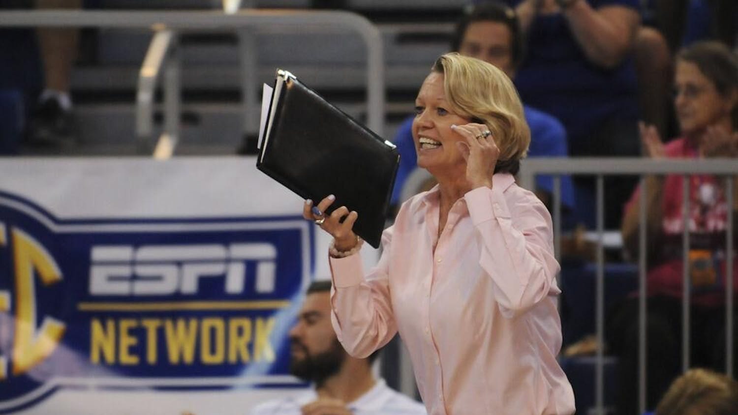 Gators volleyball coach Mary Wise shouts from the sideline 